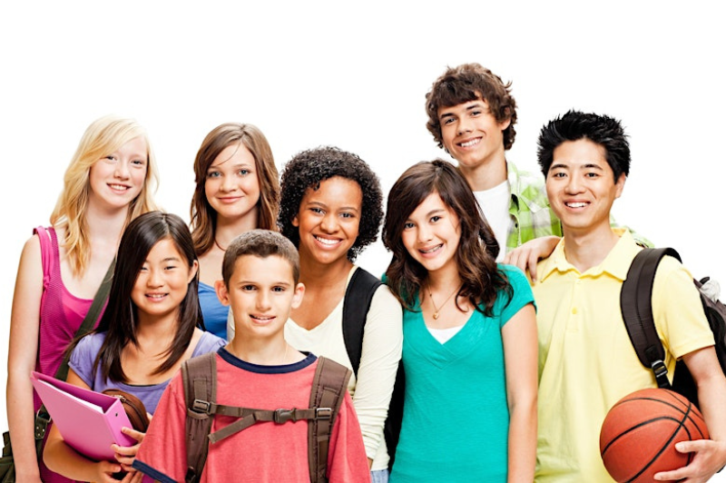 Young people in a group photo, smiling.